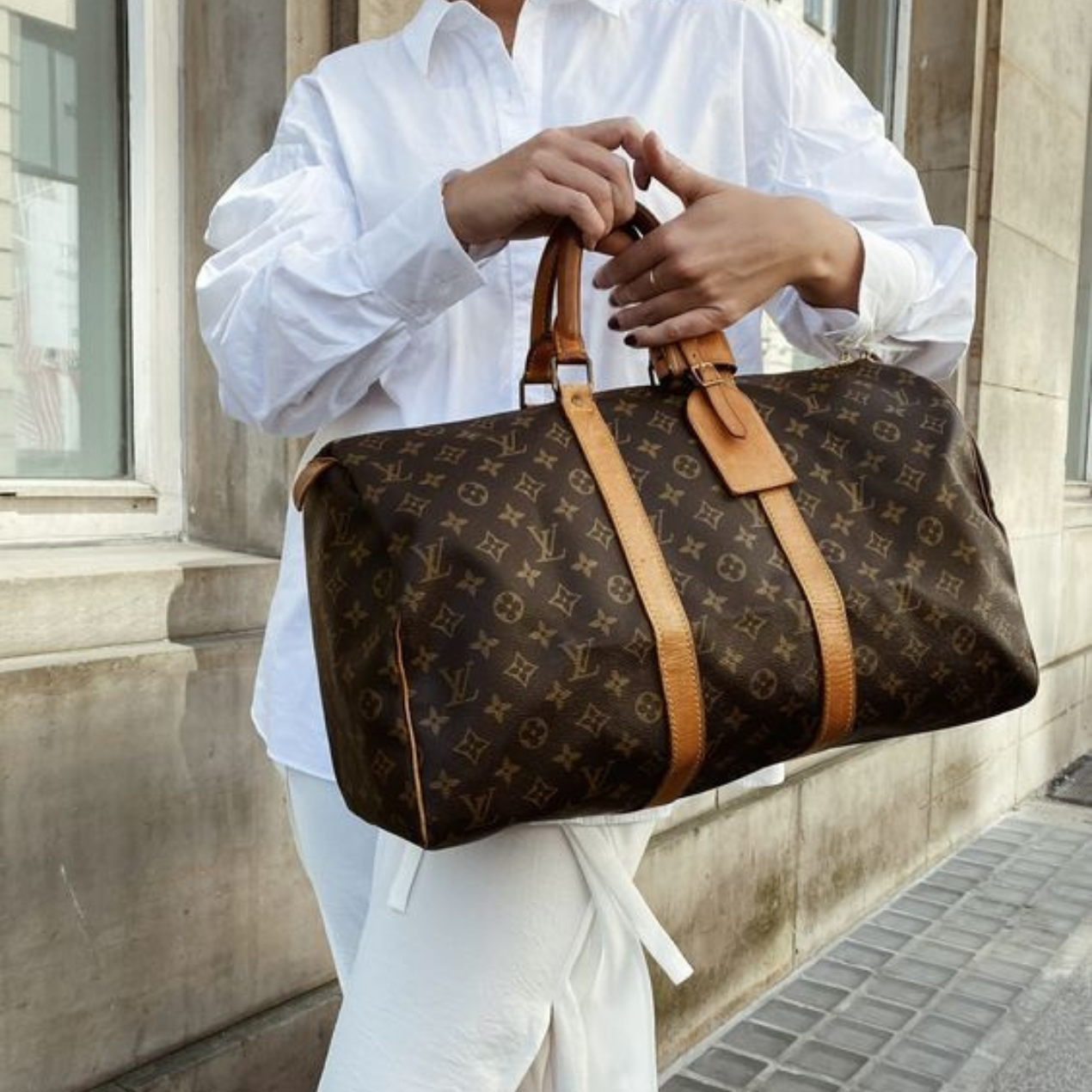 Louis Vuitton Keepall luxury designer travel bags - price guide