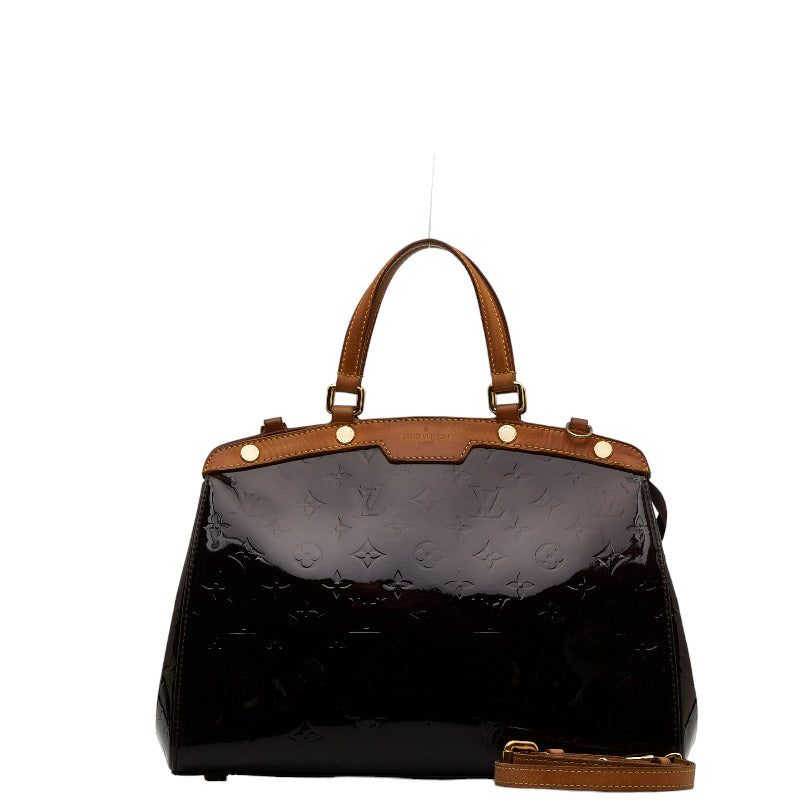 Looks We Love: Brown Platform with her Louis Vuitton Vernis Alma