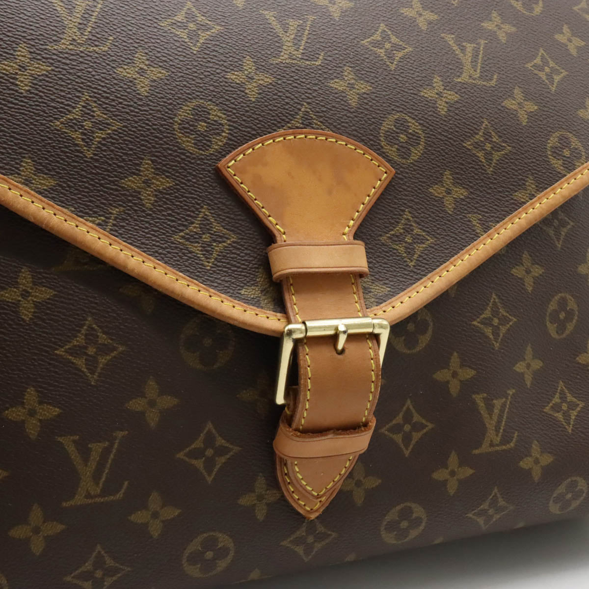 This Louis Vuitton Monogram Pochette Beverly Clutch was named