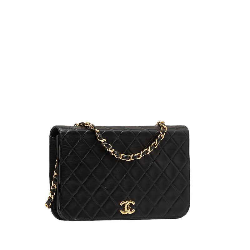 gold chanel purse black