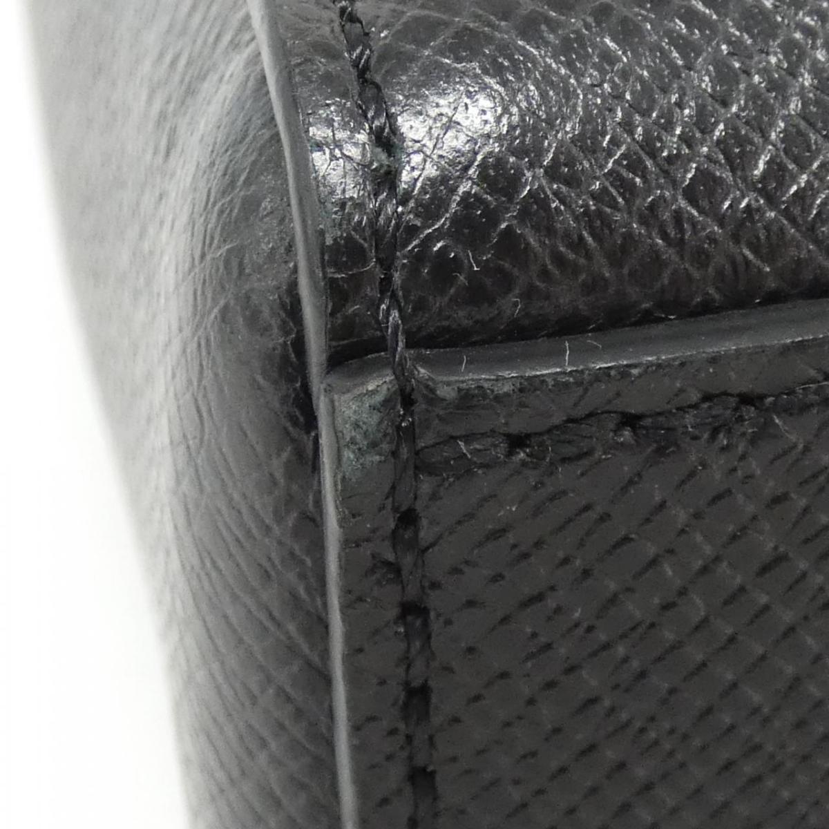 Louis Vuitton Taiga Vertical Tote M30811 Bag