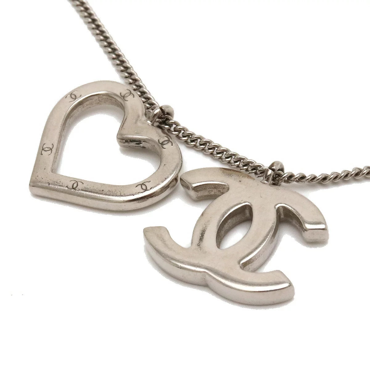 Chanel CC Heart Pendant Necklace Silver – Timeless Vintage Company