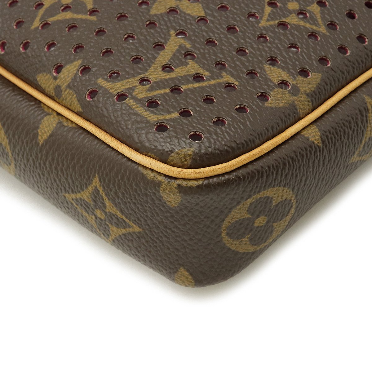 LOUIS VUITTON Monogram Perforated Pochette Accessories Bag Fuchsia