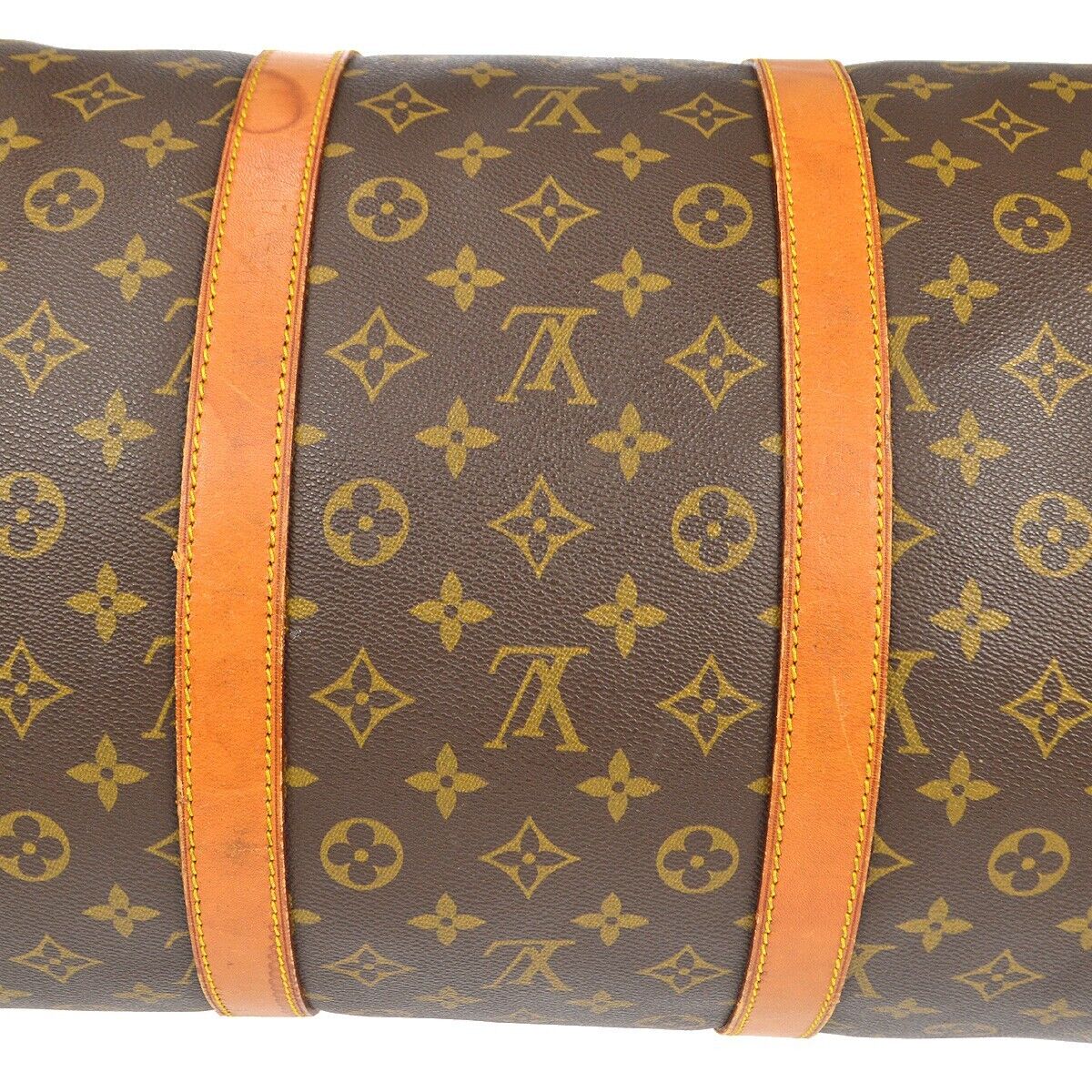SOLD. Louis Vuitton: A vintage Keepall 55 travel bag of brown