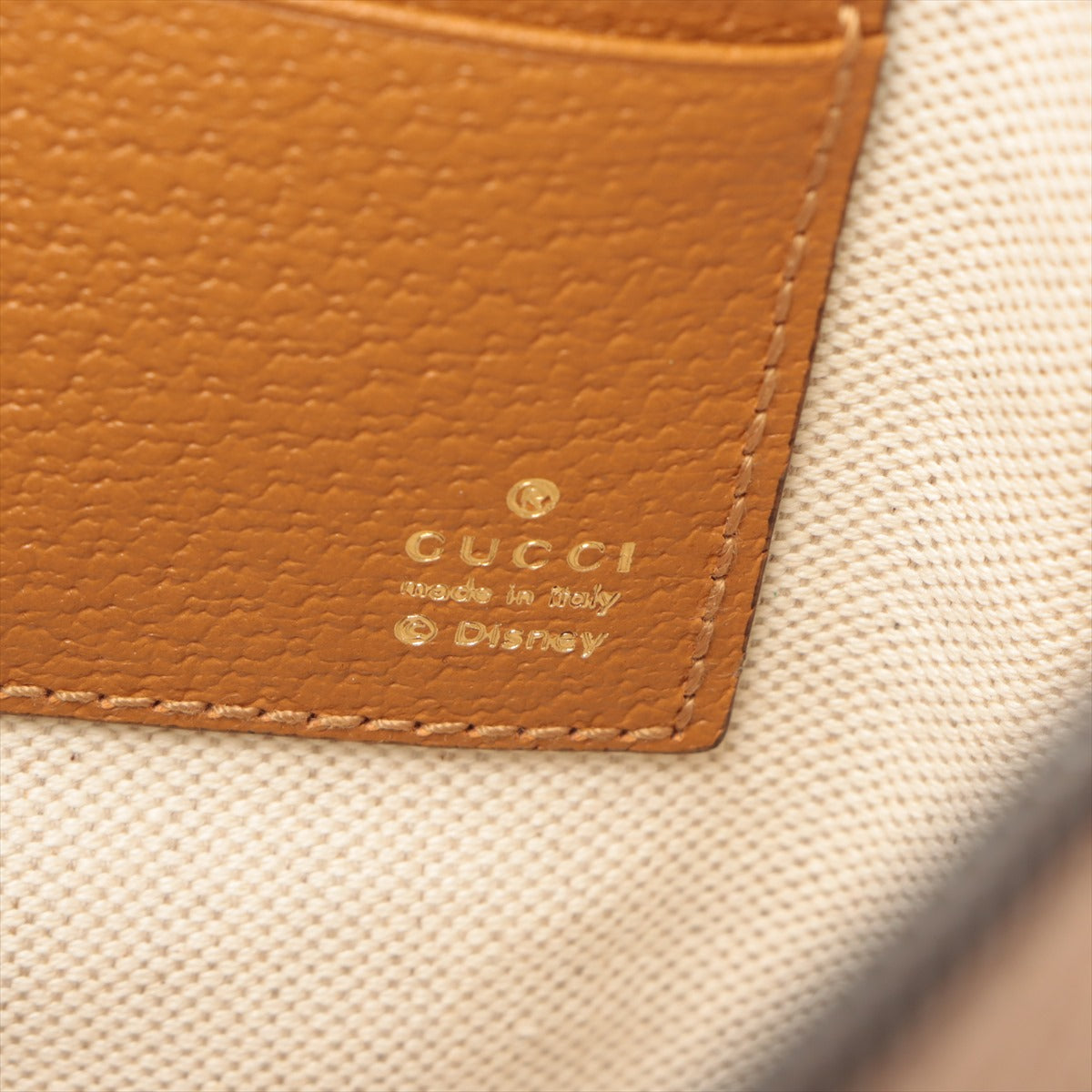 Gucci x Disney Mini GG Spring 手拿包 棕色 602552